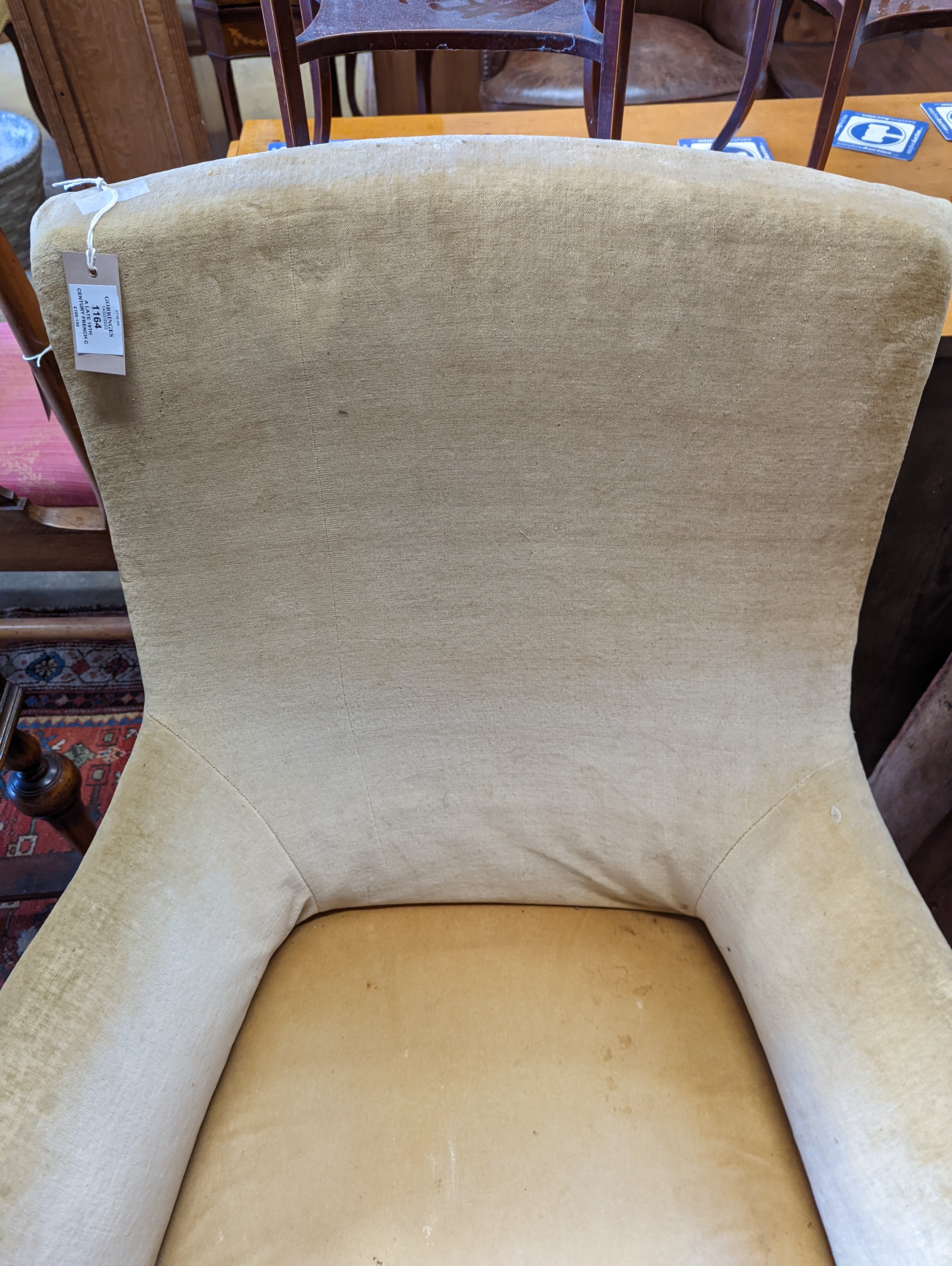A late 19th century French carved beech armchair